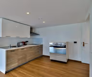 ON THE ICONIC AVENUE DE CHAMPS ELYSEES, HOME TO THE WORLD OF FASHION