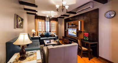 Living room at Fatima Az Zahra Street Apartments