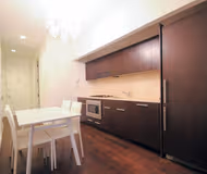 Master bedroom at Wall Street 2 Bed Furnished Apartment, Financial district