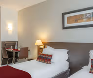 King sized bedroom at La Defense Serviced Apartment