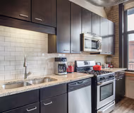 Fully equipped kitchen at W. Washington Blvd #602 Serviced Apartment, West Loop