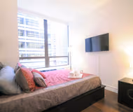 Cosy bed at Wall Street 2 Bed Furnished Apartment, Financial district
