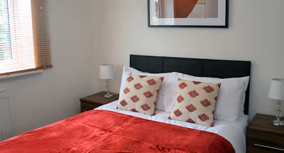 Bedroom at Royal Apartments near Hillingdon Hospital West Drayton