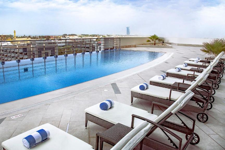 Pool side at Dubai Internet City Serviced Apartment