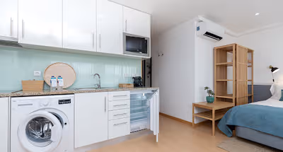 Fully equipped kitchen at Corporate Housing Marquês VI