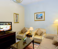 Living room at Haroon Al Rashid Street Apartments