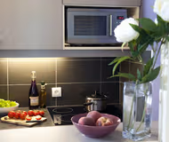 Fully equipped kitchen at Paris Buttes Chaumont Servcied Apartments, Neuilly-sur-Seine