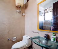 Comfy living area at Green Park Studio Apartments