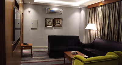 Living area at Al Manani Street Serviced Apartment