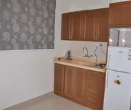 Kitchen at Al khalifa Al Mamoon Street Serviced Apartment