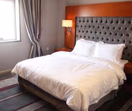 Bedroom at Al Manani Street Serviced Apartment