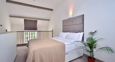 Open plan bedroom at Pemberton Gardens Apartments near Archway