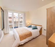 Luxury bedroom at Central Durham Riverfront Apartment