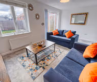 Living area at Modern 4 Bedroom Apartment