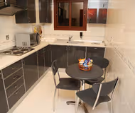 Full kitchen at Mutaib bin Abdulaziz Road Serviced Apartment