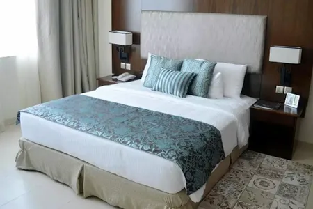 Bedroom at Sheikh Zayed Rd Serviced Apartments, Dubai