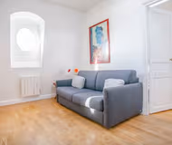 A HAUSSMANNIAN BUILDING- A MARAIS ABODE