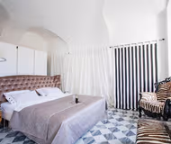 BASKING IN SUNSHINE WITH 180° LAKE VIEWS OVERLOOKING THE MAJESTIC MOUNTAINS & COMO