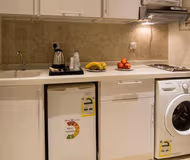 Basic kitchenette at Hamad Al Jaser Road Serviced Apartments
