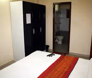 Simplistic living area in E-City Apartments