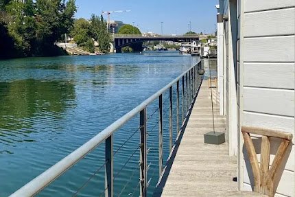 A GRAND LUXURY IN NEUILLY ON THE BACKDROP OF RIVERSIDE GREENRYOF ILE DE PUTEAUX