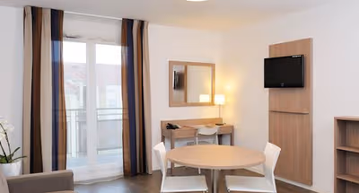 Spacious living area at Roissy Village Serviced Apartment, Champs Elysees