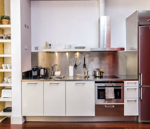 Full kitchen at Passatge de Mas de Roda Serviced Apartments