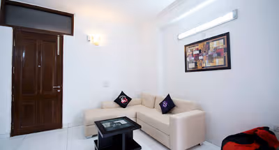 Comfy living area at Green Park Studio Apartments