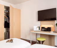 Luxury bedroom at Paris Châtillon Apartment, Champs Elysees