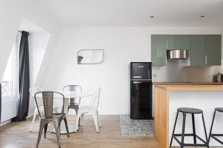 Simplistic living area in Saint Honore Serviced Apartment, Champs Elysees