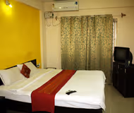 Spacious living area at E-City Apartments