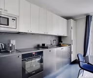 A LARGE PLUSH NEST NEXT TO ST SULPICE