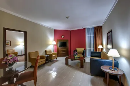 Bright living area at Al Muraqqabat Street Serviced Apartments