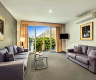 Simplistic living area in Quest Prahran