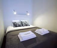 Bedroom at Forenom Helsinki Albertinkatu