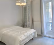 Double bed bedroom at HAUSMANNIAN LUXURY ON  AVENUE FRANKLIN DELANO ROOSEVELT