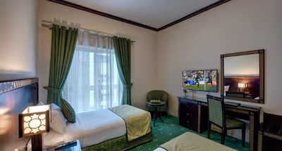 Bedroom at Omar Bin Al Khatab Street Serviced Apartments, Deira
