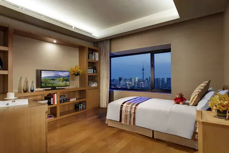 Luxury bedroom at Somerset International Building Tianjin