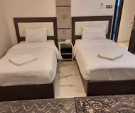 Bedroom at Al Ghubrah Street Serviced Apartment