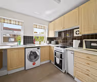 Fully equipped kitchen at Chariotts Place