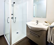 Simplistic living area in Quest Albany