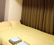 Simplistic living area in Akasaka 2-Chome Apartments