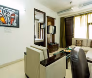 Comfy living area at Saket Apartments, New Delhi