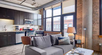 Bright living area at W. Washington Blvd #602 Serviced Apartment, West Loop