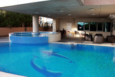 Pool side at Clock Tower Street Serviced Apartments, Deira