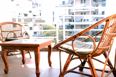 Simplistic living area in Rakshak Nagar Apartments