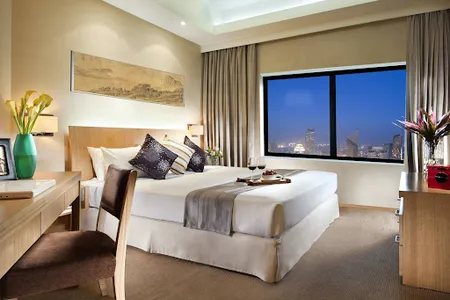 Bedroom at Somerset International Building Tianjin