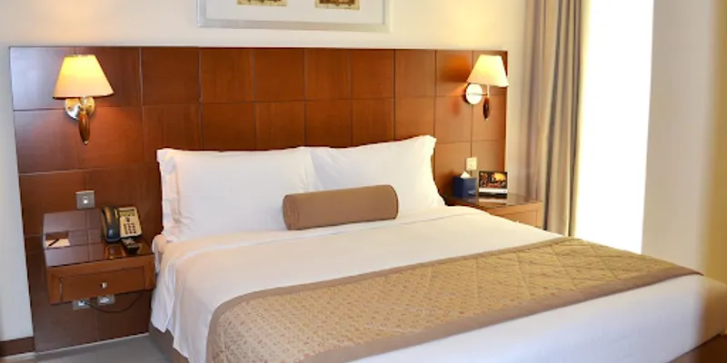 Luxury bedroom at Al Rawda Arjaan Serviced Apartments, Nahyan Camp