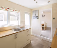 Fully equipped kitchen at Stylish Modern House