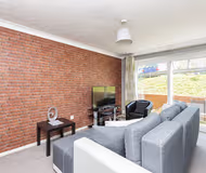 Bright living room at Nightingale Suite